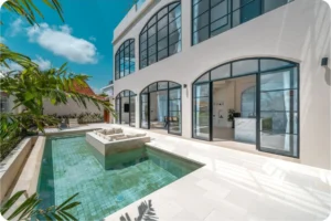 Modern villa in Bali with private pool and open architecture, ideal for showcasing top areas to buy investment property.