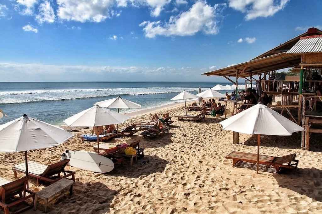 Chill vibes and surf breaks at Balangan Beach, Bali’s hidden gem for sun-seekers and wave riders alike.