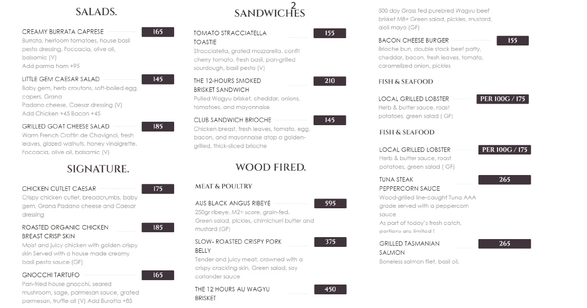 2. Menu page listing salads, sandwiches, ribeye, pork belly, lobster