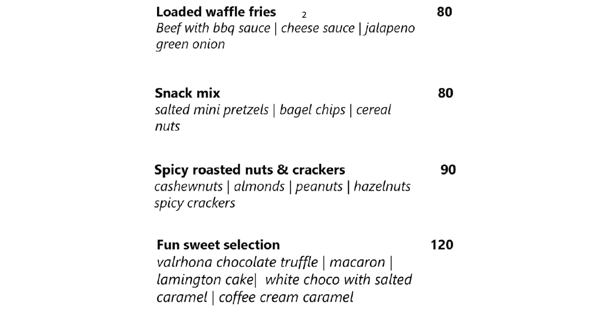 The Edge Bar Bali: Uluwatu's Most Stunning Cliffside Bar 9 2. Menu page with waffle fries, snack mix, nuts, and sweets