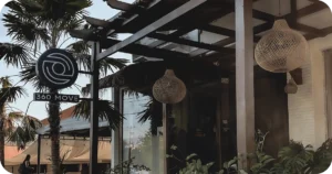 360 MOVE exterior with logo sign and shaded entrance