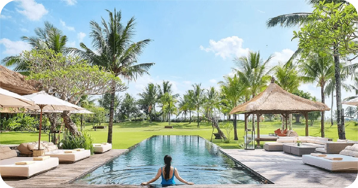 Aerial estate showing long pool gardens tennis court and rice fields