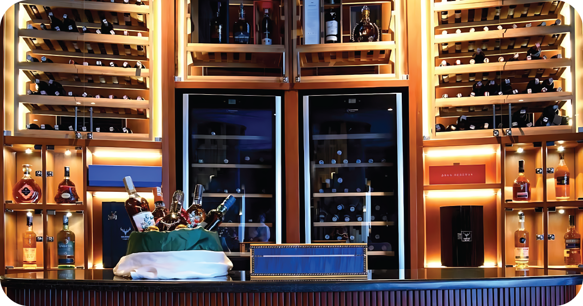 Backlit wine cabinets with twin coolers and liquor showcase