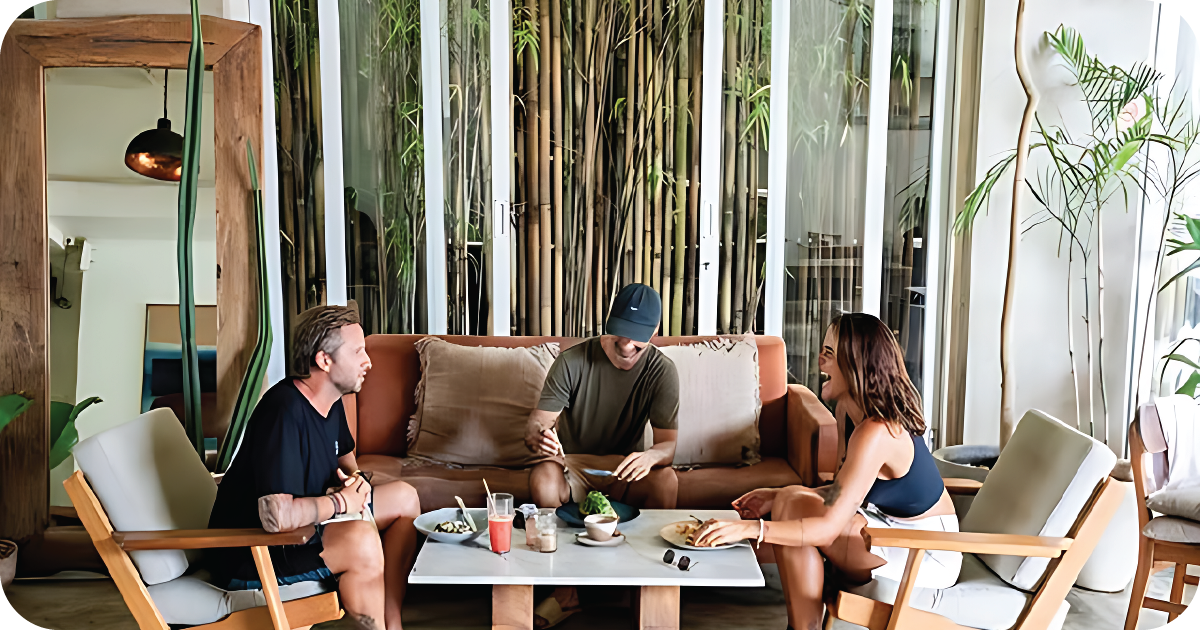 Casual sofa seating with bamboo backdrop and shared plates