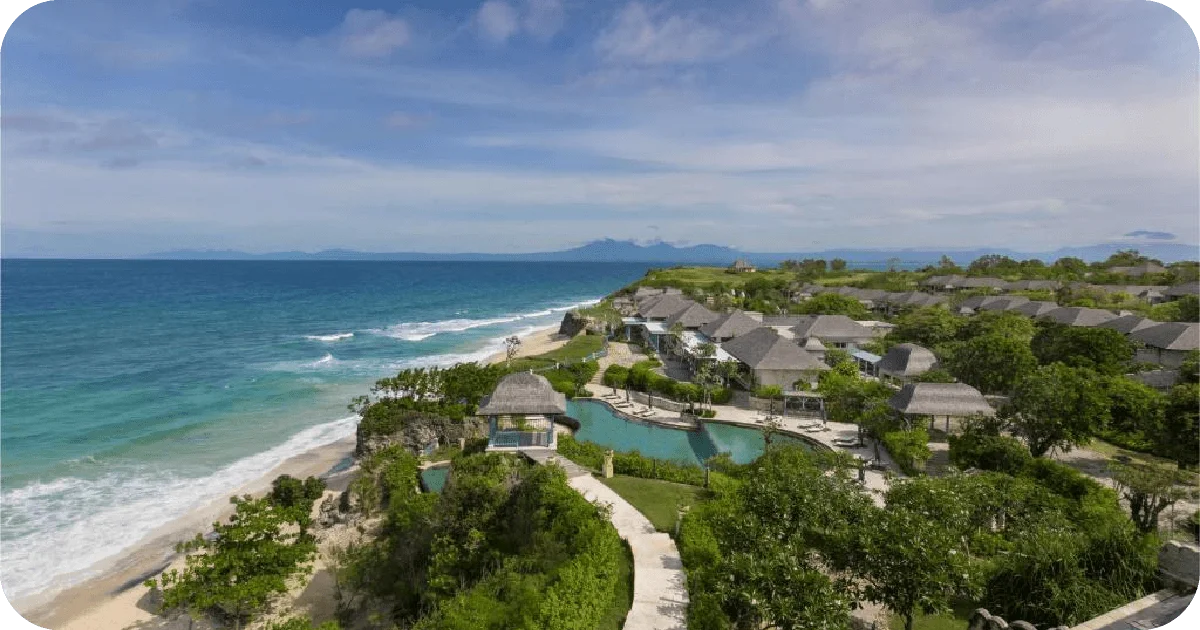 Clifftop resort with lagoon-style pool overlooking a sandy beach