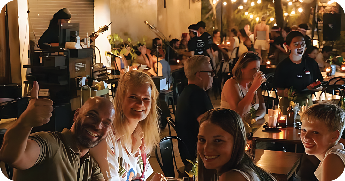 Nighttime dining with live music and string lights