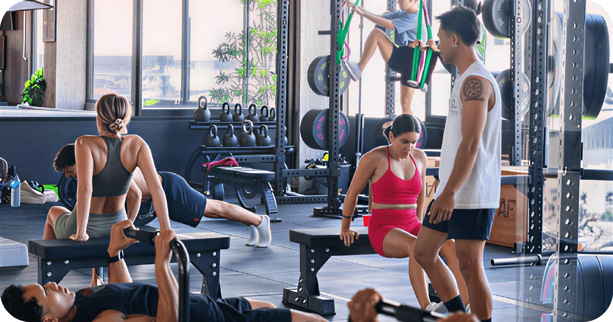 Surya Gym Bali: The Ultimate Review of Canggu's Premier Fitness Destination 5 Busy functional area with benches, kettlebells and suspension bands