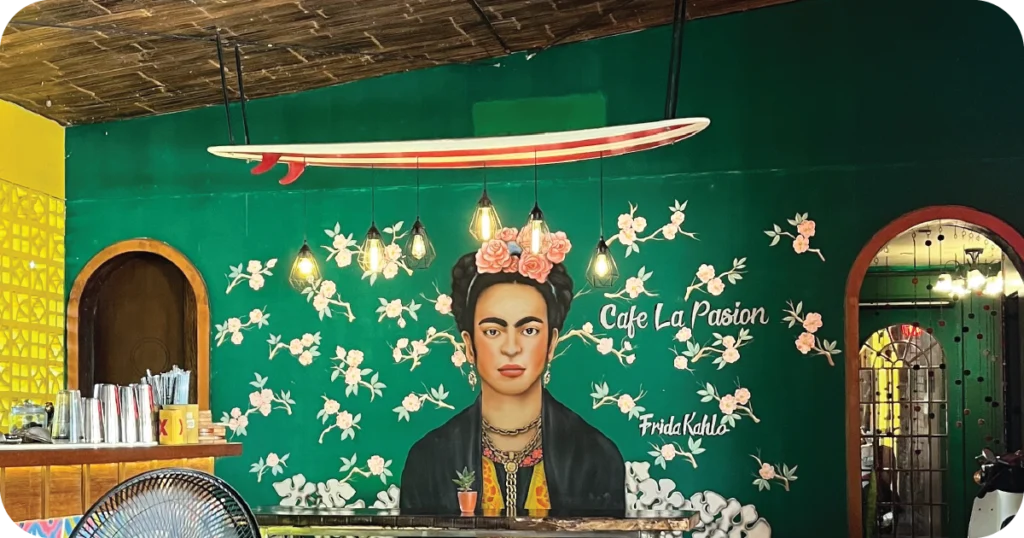 Cafe La Pasion mural with Frida Kahlo and hanging lights