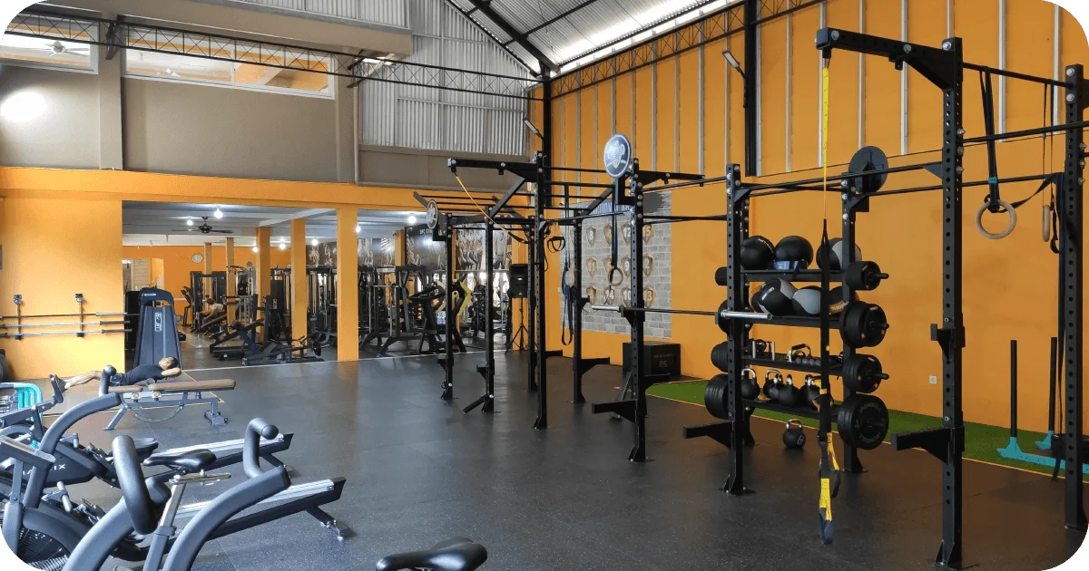 Functional training rigs with kettlebells, medicine balls and turf lane