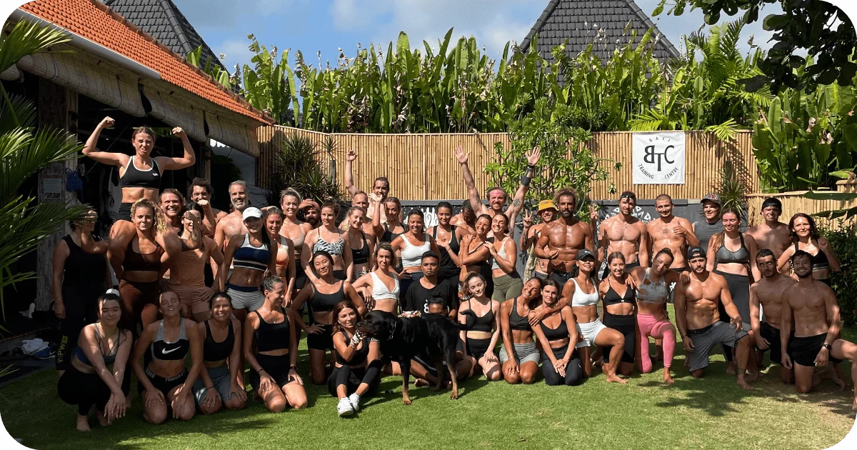 Large group photo after workout, BTC Training Centre sign