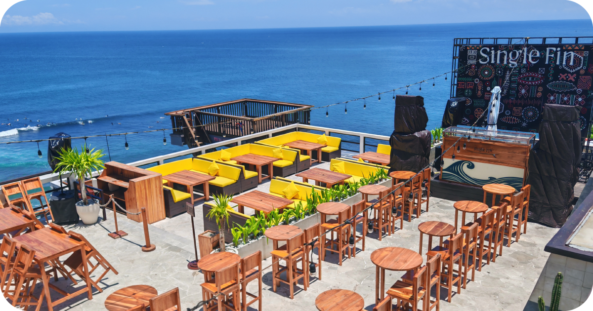 Single Fin oceanfront rooftop bar with yellow lounge seating