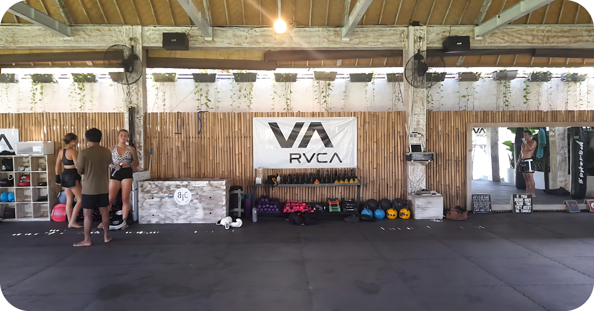 Strength zone with kettlebells, dumbbells and medicine balls under RVCA banner